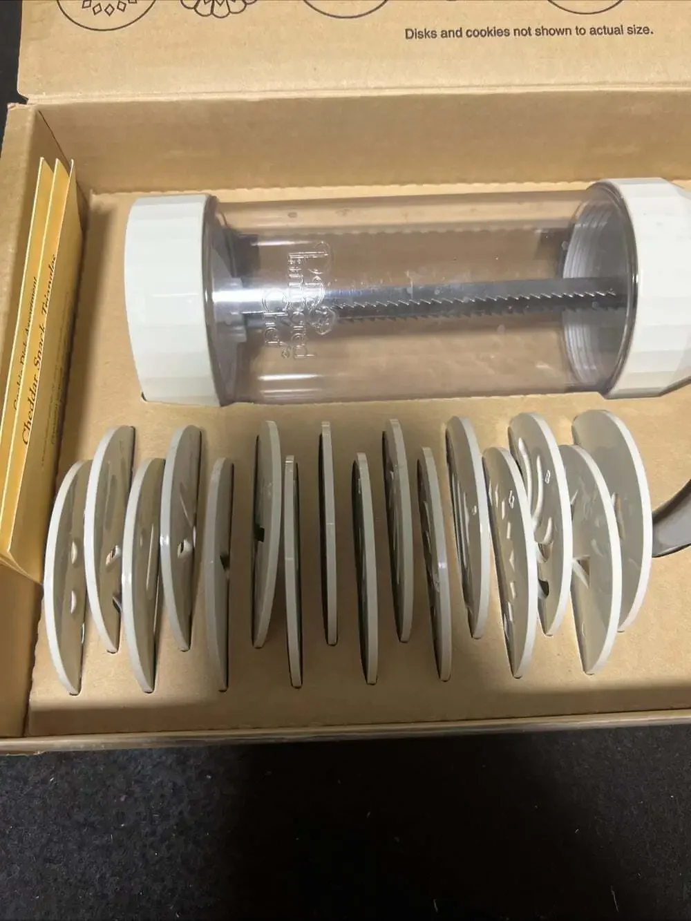 The Pampered Chef 1525 Cookie Press with 16 Discs - White